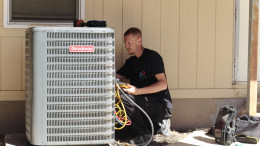 Frank, an Infinity AC of Austin tech, repairing a system Frank, an Infinity AC of Austin tech, repairing a system